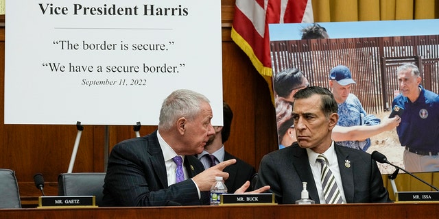 U.S. Rep. Ken Buck, R-CO, left, confers with U.S. Rep. Darrell Issa, R-CA, during a hearing on U.S. southern border security on Capitol Hill, February 01, 2023, in Washington, DC.